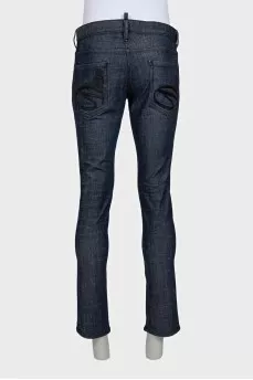 Men's blue jeans with logo on the pocket