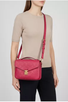 Pochette Métis leather bag with signature embossing