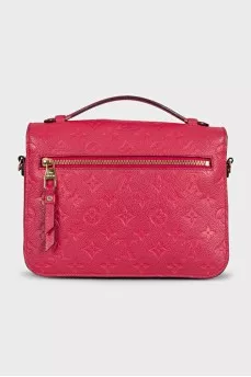 Pochette Métis leather bag with signature embossing