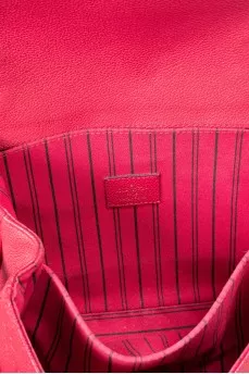 Pochette Métis leather bag with signature embossing