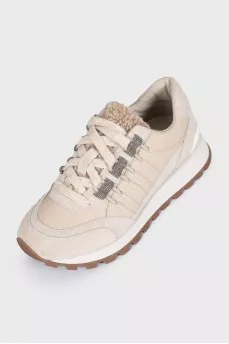 Beige leather sneakers with fur trim