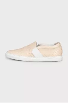 Beige leather slip-ons with embossing