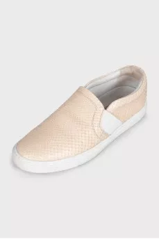 Beige leather slip-ons with embossing