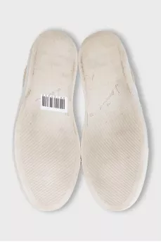Beige leather slip-ons with embossing