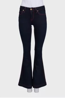 Blue flared jeans with contrast seams
