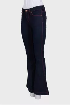 Blue flared jeans with contrast seams