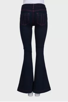 Blue flared jeans with contrast seams