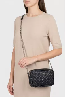 Black quilted leather bag with decoration