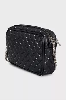 Black quilted leather bag with decoration