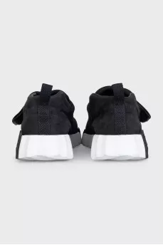 Black suede sneakers with a lug sole