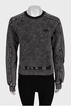 Gray sweatshirt with a distressed effect