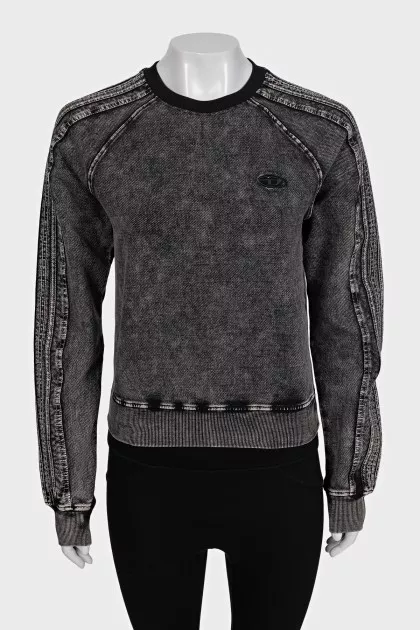 Gray sweatshirt with a distressed effect