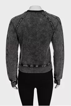 Gray sweatshirt with a distressed effect