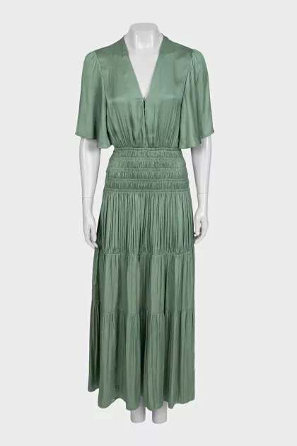 Green fitted dress with draping