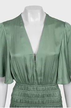 Green fitted dress with draping