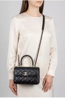 Black quilted bag with chain strap