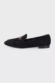 Black suede loafers with gold trim