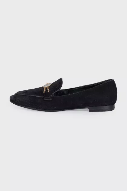 Black suede loafers with gold trim