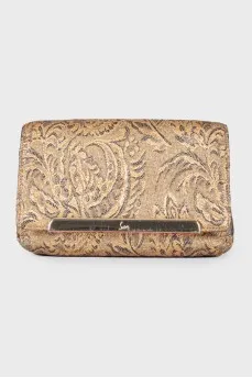 Golden patterned clutch bag