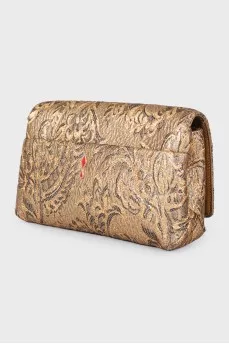 Golden patterned clutch bag