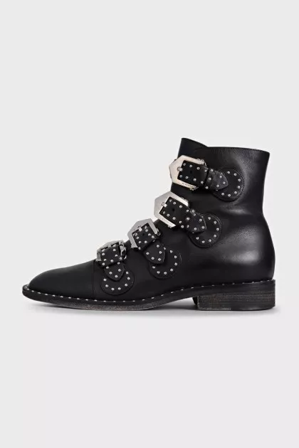 Black leather boots with silver decor
