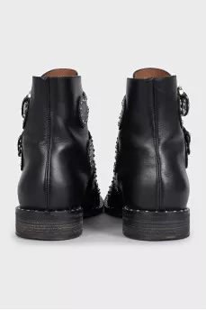 Black leather boots with silver decor