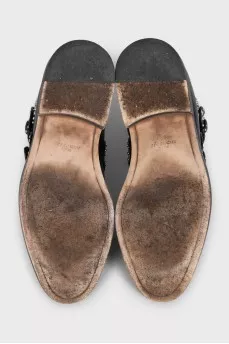 Black leather boots with silver decor