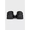 Men's black leather and canvas sneakers