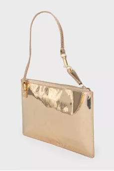 Golden clutch from a brand's logo