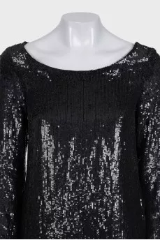 Black dress decorated with sequins with long sleeves