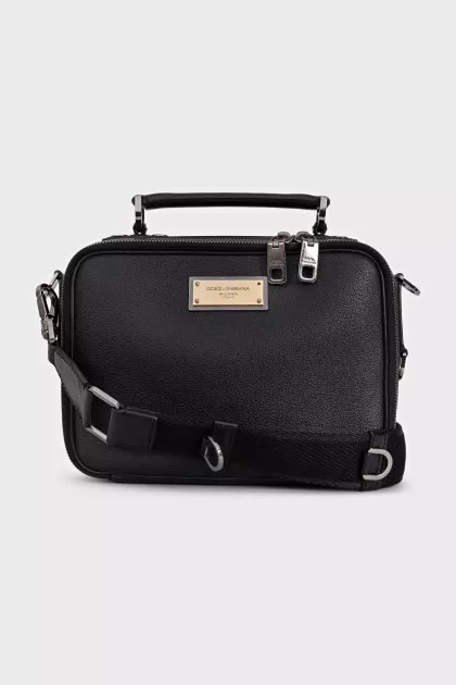 Black leather crossbody bag with metal logo