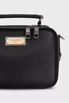 Black leather crossbody bag with metal logo