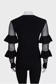 Jumper with transparent sleeves