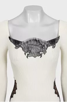 Fitted dress with lace-embellished sleeves