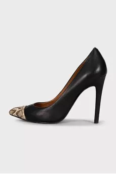 Black shoes with a printed toe and metallic embellishments