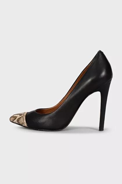 Black shoes with a printed toe and metallic embellishments