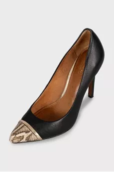 Black shoes with a printed toe and metallic embellishments