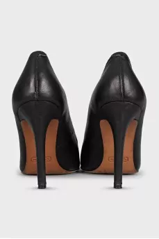 Black shoes with a printed toe and metallic embellishments