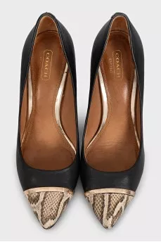 Black shoes with a printed toe and metallic embellishments