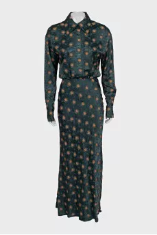 Green fitted dress with a print