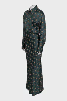 Green fitted dress with a print
