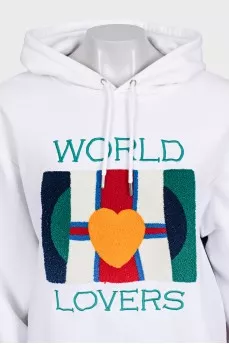 White hoodie decorated with embroidery