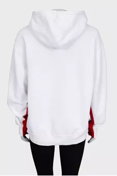White hoodie decorated with embroidery