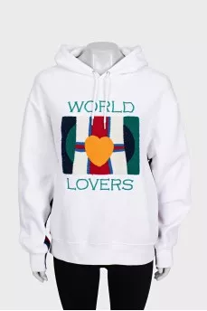White hoodie decorated with embroidery