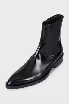 Black leather pointed toe boots