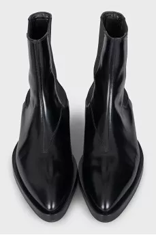 Black leather pointed toe boots