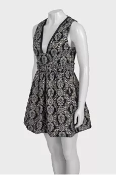 Fitted printed dress with a full skirt