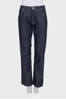 Dark blue jeans with embroidery on the pocket