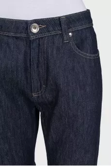 Dark blue jeans with embroidery on the pocket