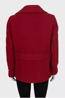 Red double-breasted coat with a short cut